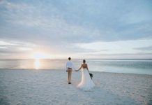Beach Weddings in the Florida Panhandle (West End) White Sands & Open Spaces man and woman walking on beach during daytime
